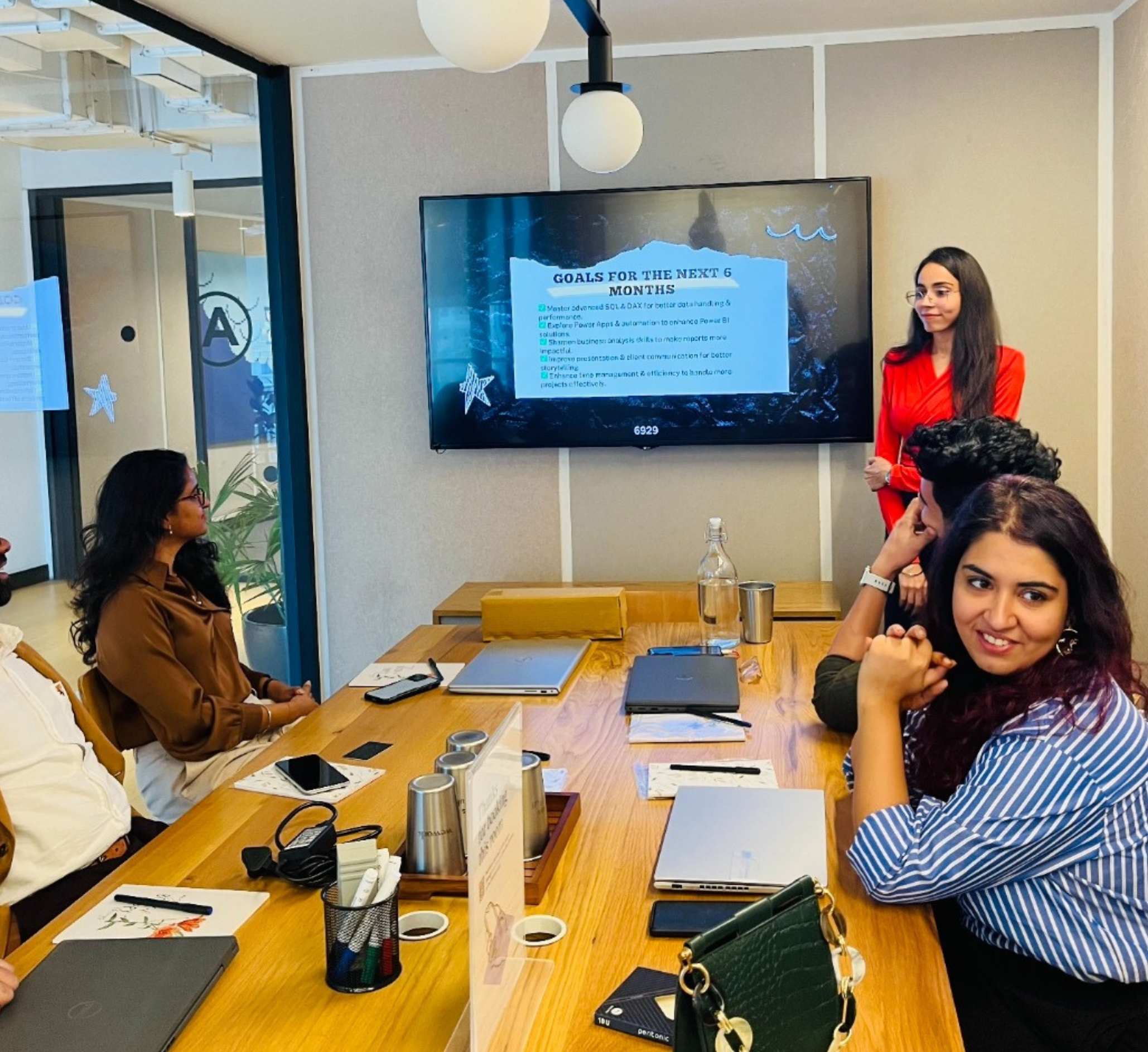 Datanomy Technologies consultants collaborating on a client data project